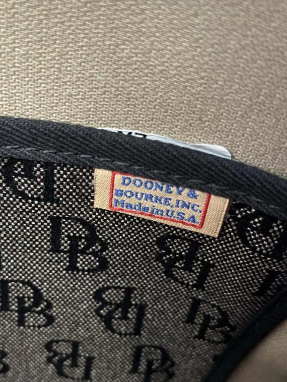 Dooney & Bourke signature monogram bucket tote